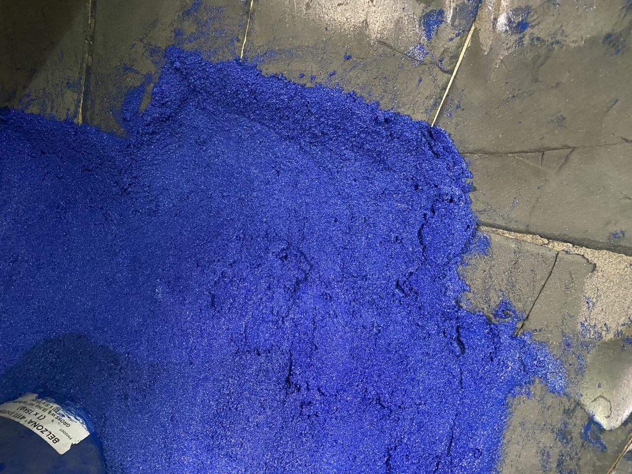  Close up of Belzona 1818 on the turbo separator showcasing its vibrant blue colour which offers contrast when applying in poorly lit conditions 