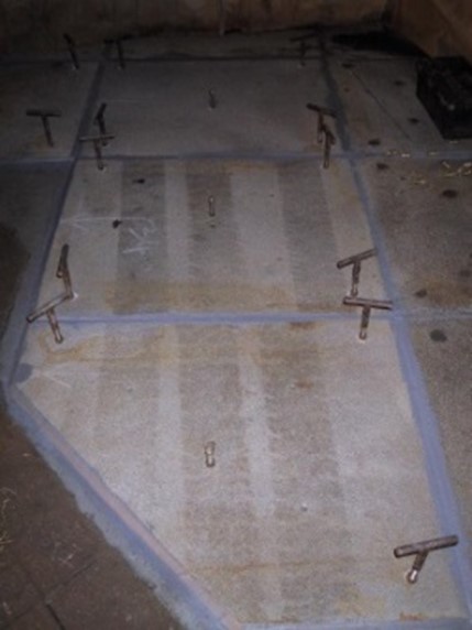 Plates cold bonded onto deck with epoxy materials