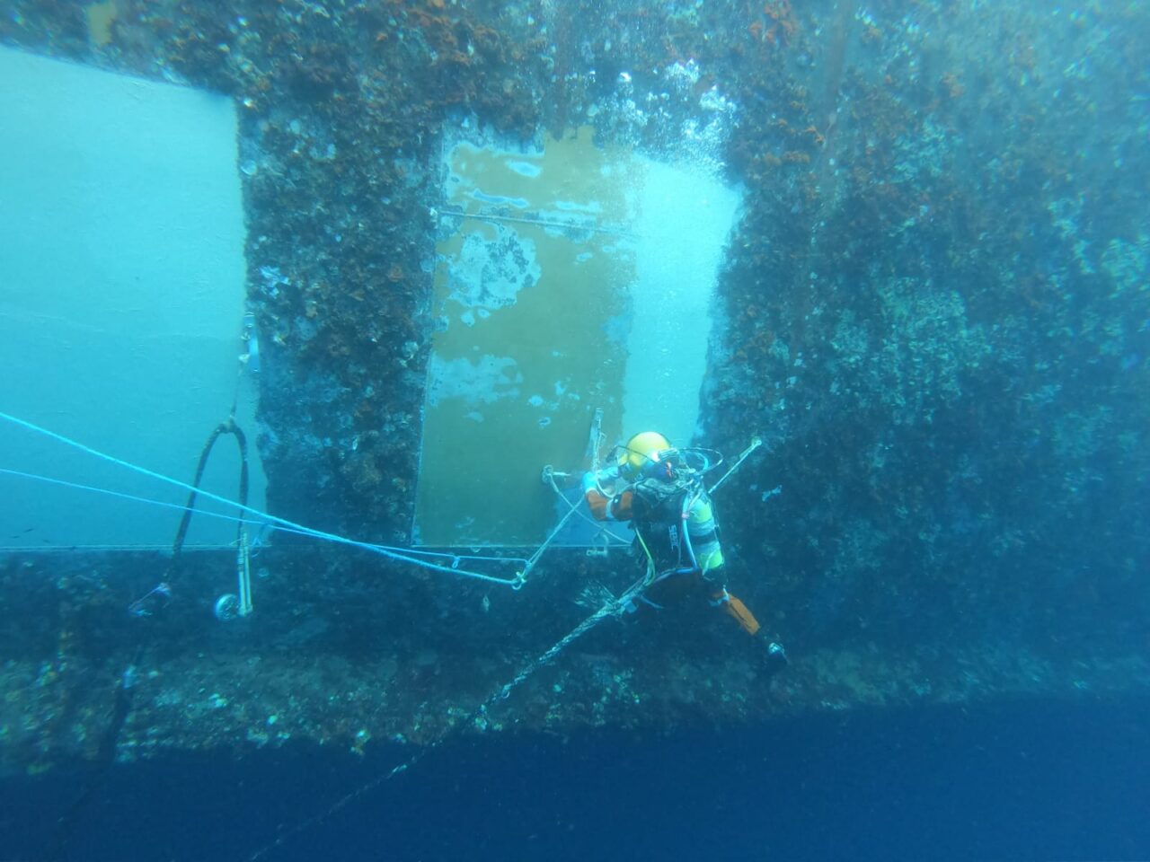 A Jones Marine diver applying Belzona 5831 to a vessel