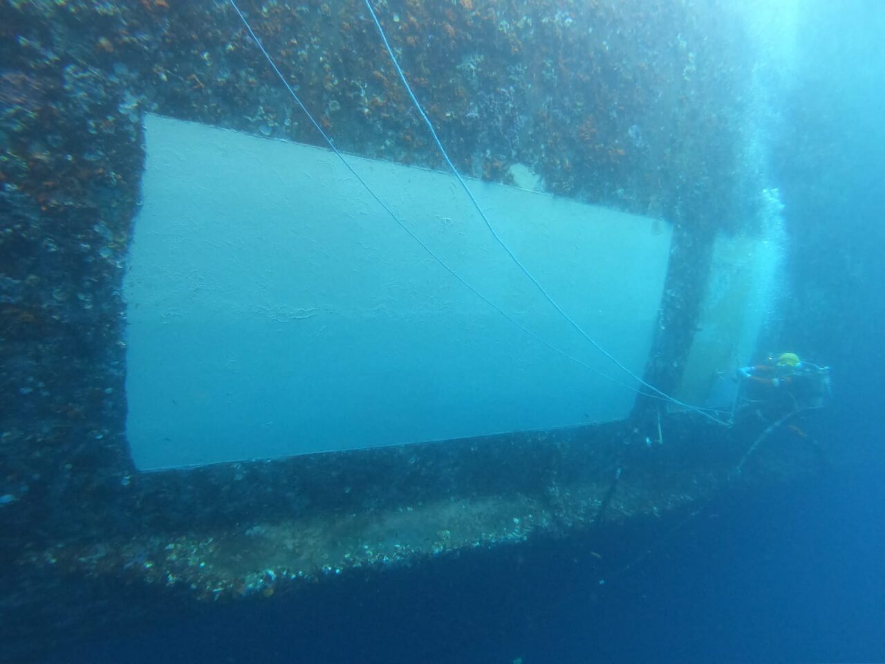 A Jones Marine diver applying Belzona 5831 to a vessel