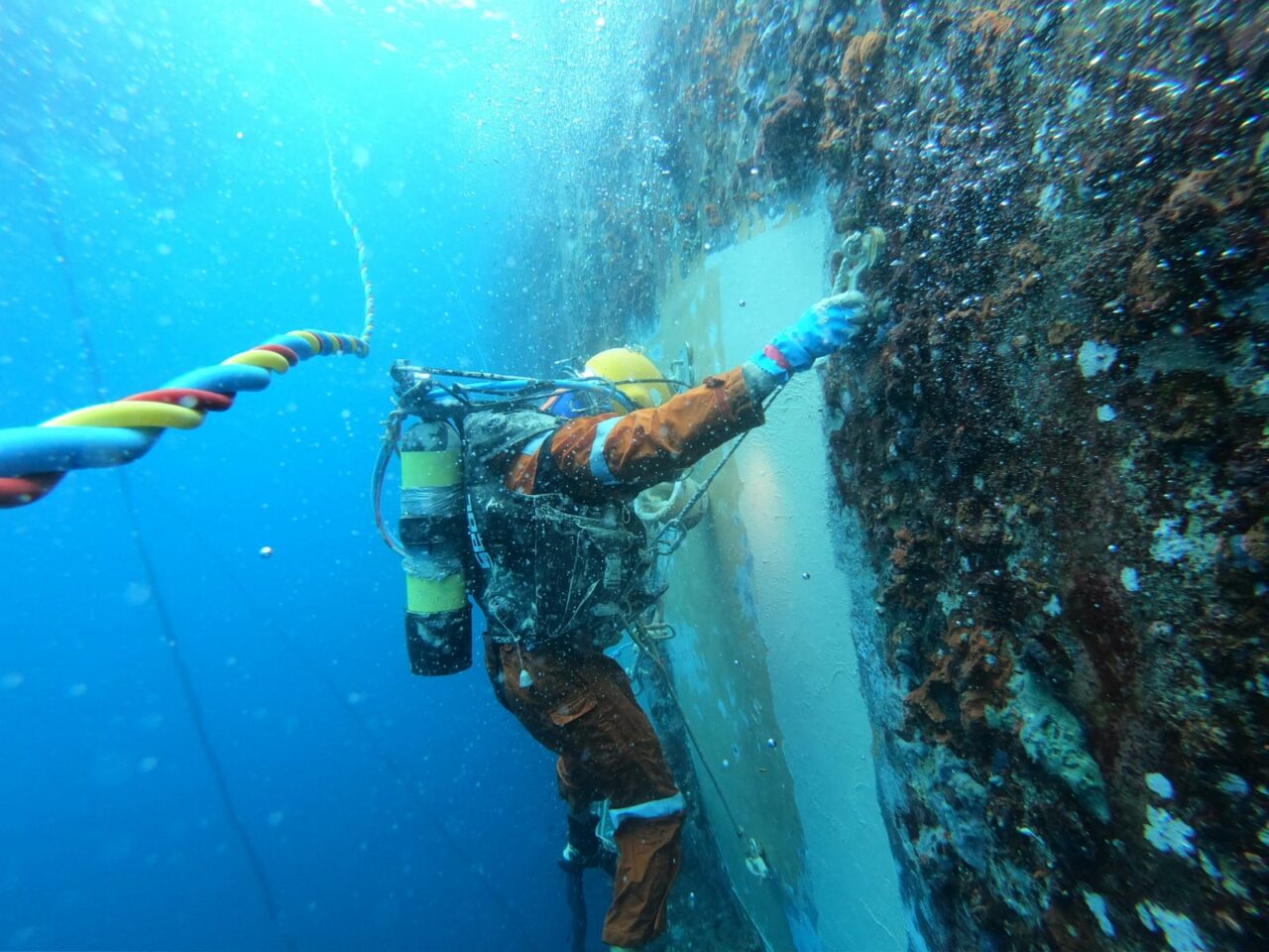 A Jones Marine diver applying Belzona 5831 to a vessel