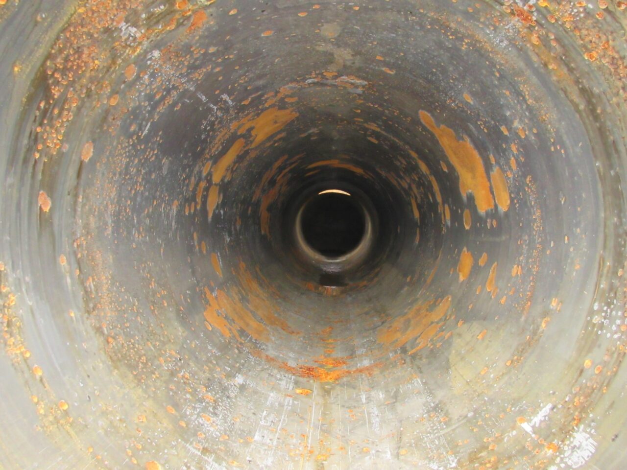 Corroded interior of a pipe