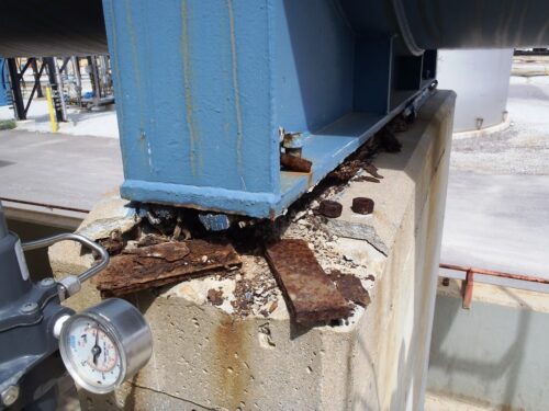 Metal shim experiencing corrosion