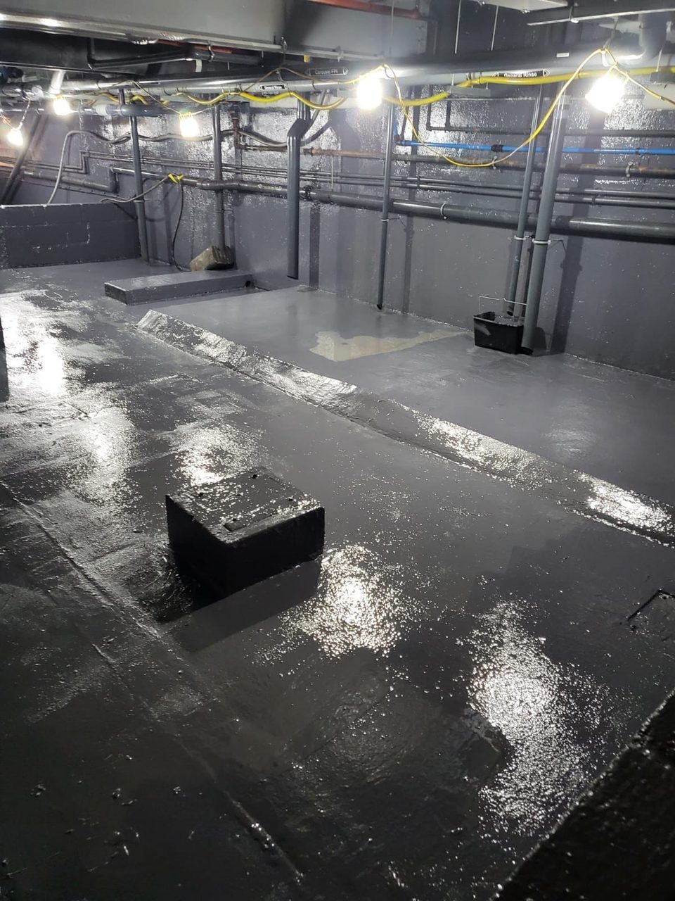 First Coat of Belzona 4311 (Magma CR1) applied to Bund