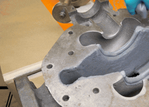 Lower the rotating element into position, forming the pump body to its exact shape