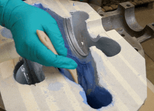 Apply the second coat of Belzona 1341 on pump